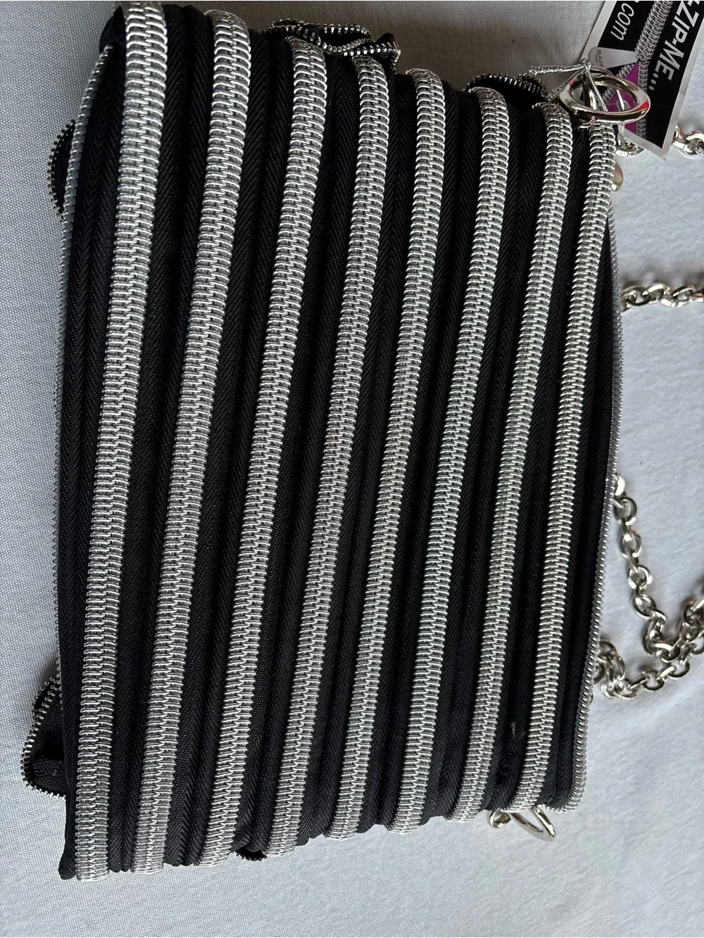 black and silver bag by BAM Bag